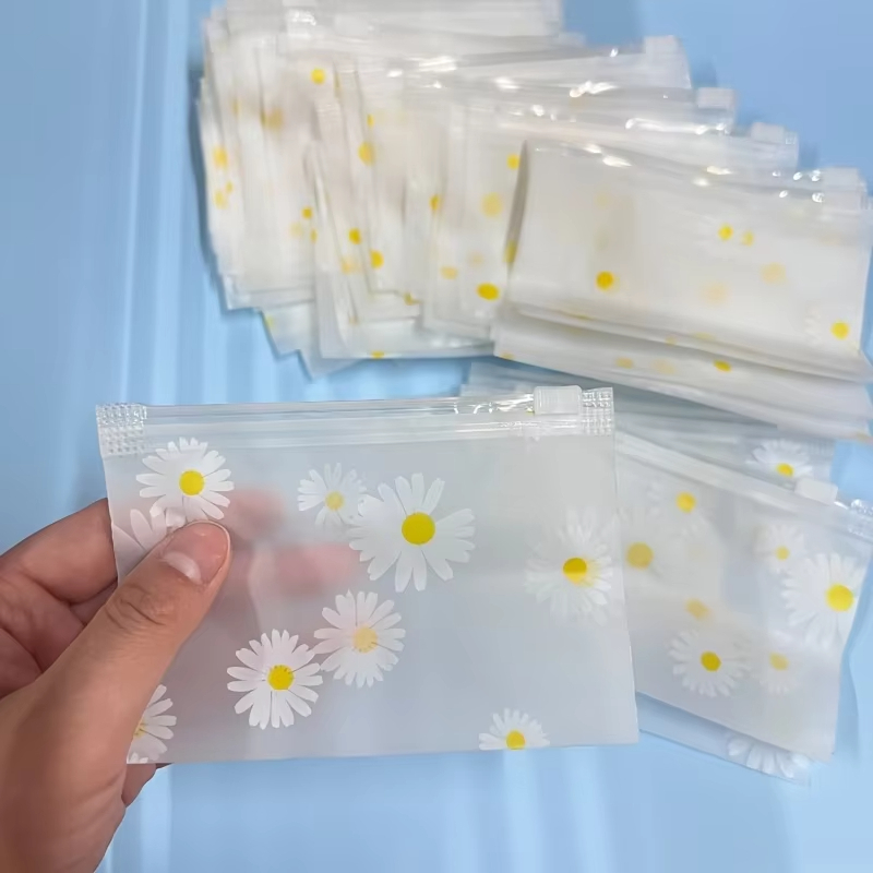Print Daisy Frosted Zipper Bag - огляд і ціна Travel Accessories Jewelry