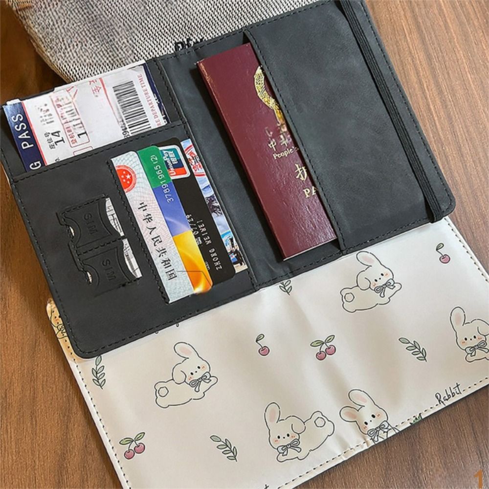 Rabbit Print Passport Holder U - огляд і ціна Travel Accessories Wallet